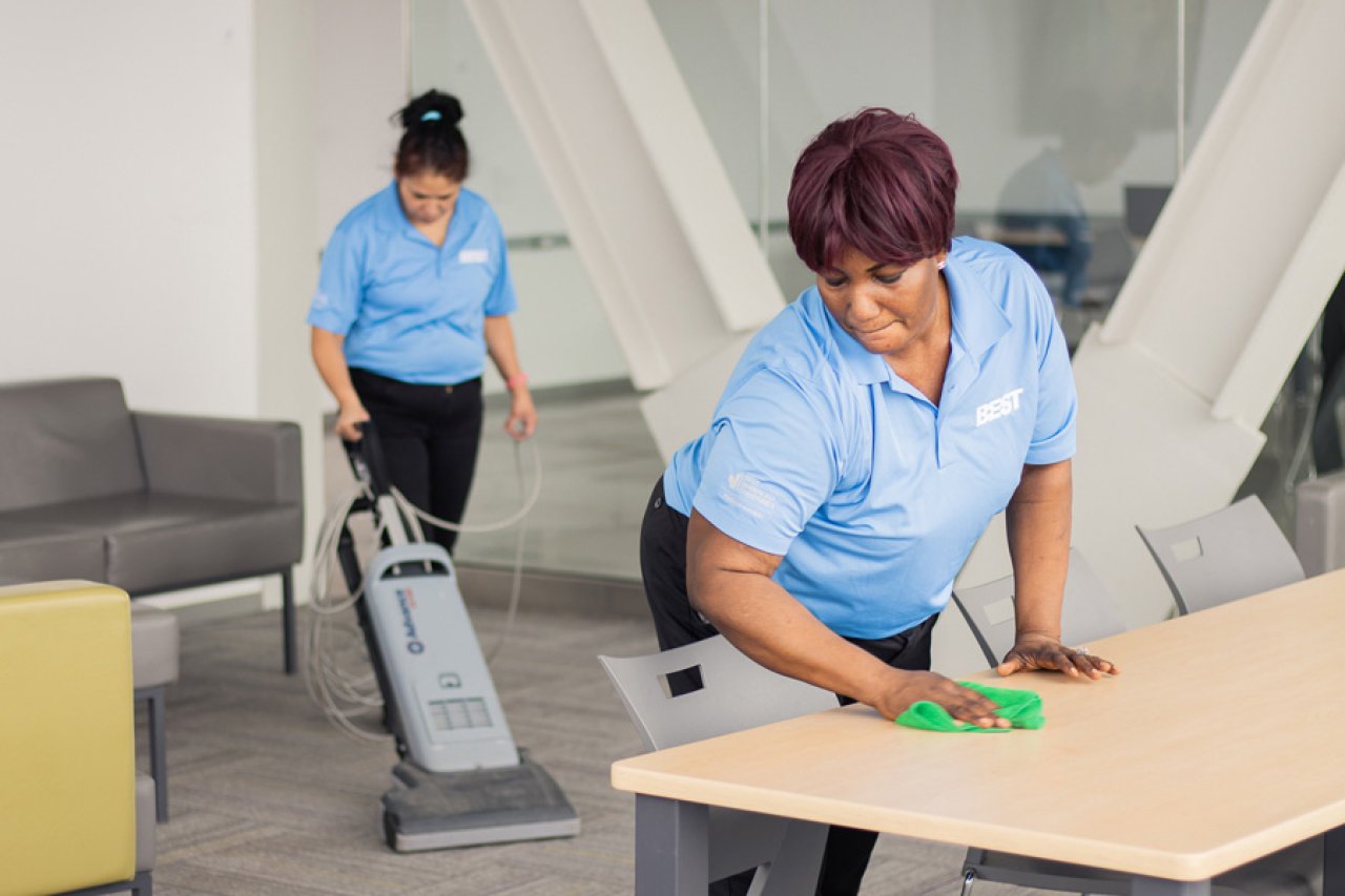 Picture of team members cleaning a worksite.