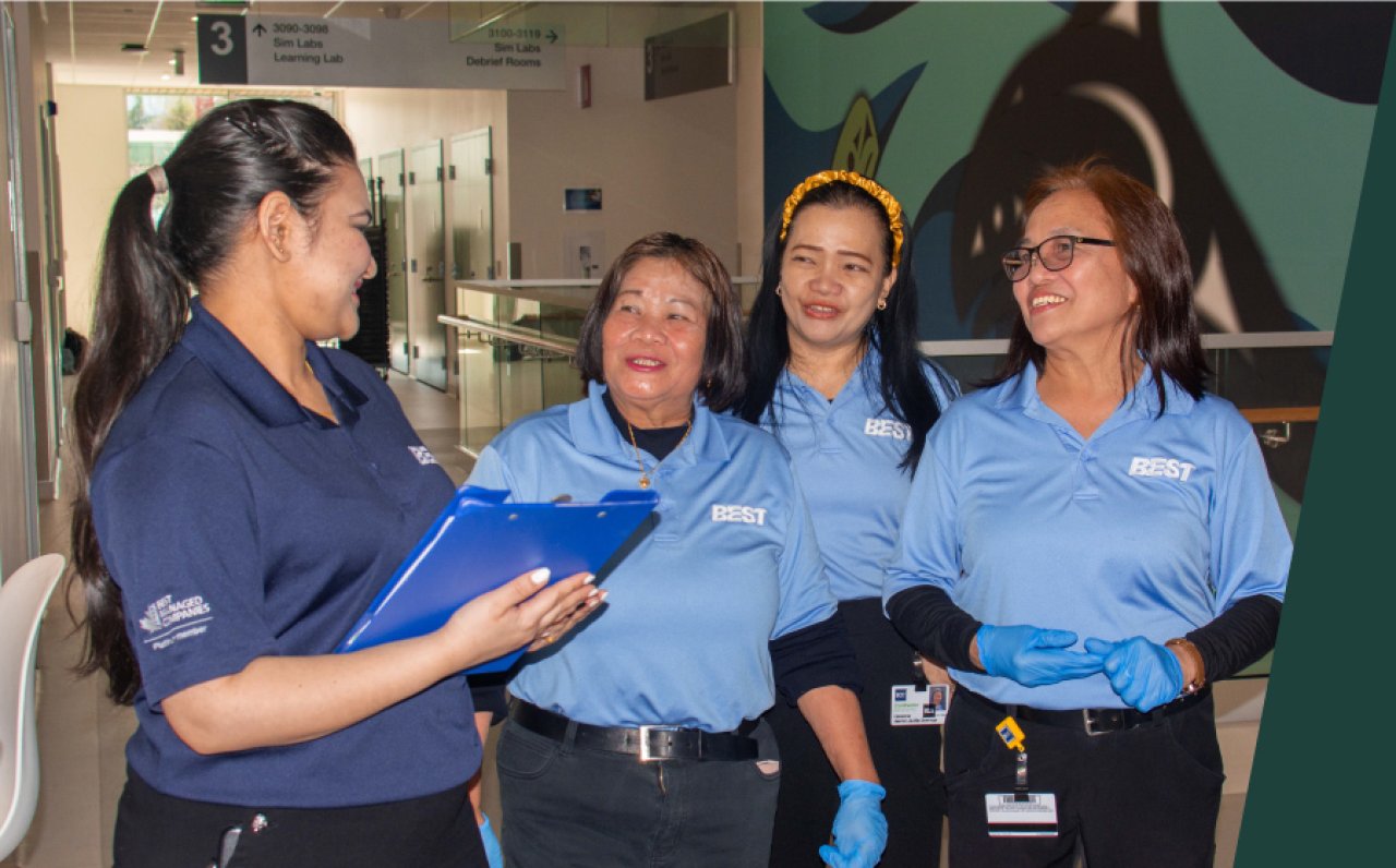 Picture of a manager explaining something to team members on-site.