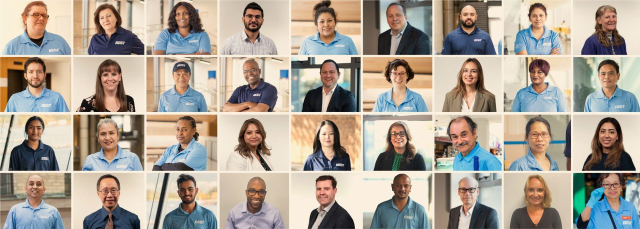 Company banner showcasing team members.