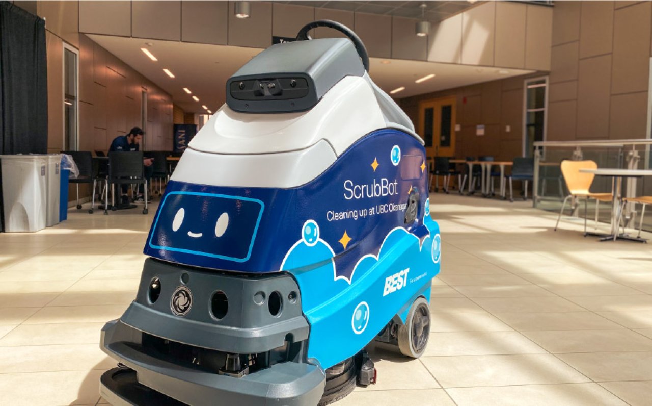 Automated scrubbing machine for floor cleaning.